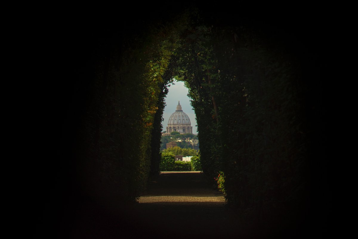 St. Peter's Basilica framed through the Knights of Malta keyhole on the Aventine Hill in Rome