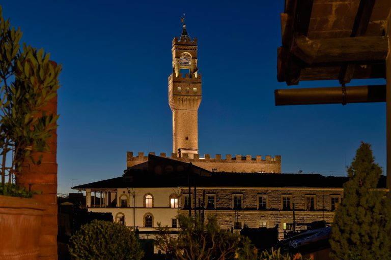 Villa Nau, Florence — Palazzo Vecchio at dusk from the terrace