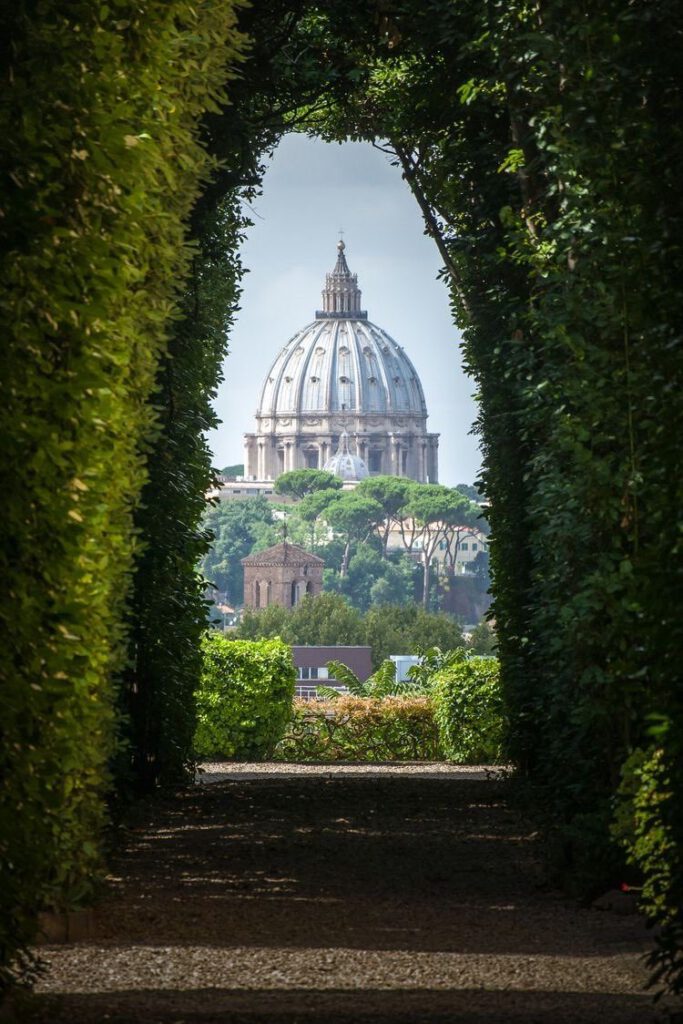 The dome of St. Peter's seen through the keyhole on Rome's Aventine Hill