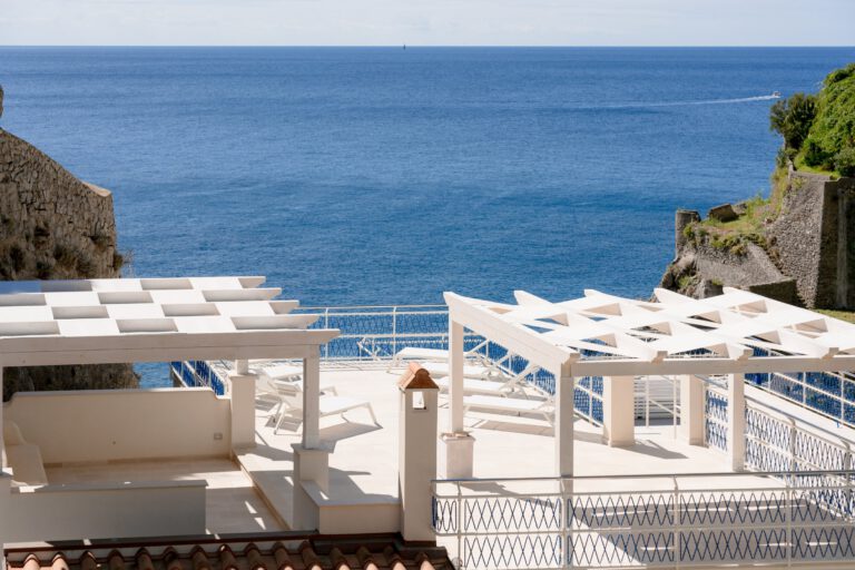 Villa Marelda — Sea-view terrace with white parapet