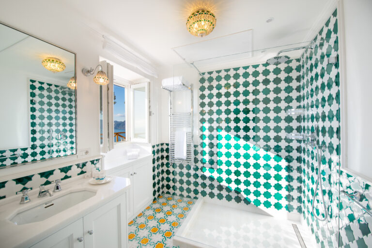 Villa Nuea — Blue-glass-tile en-suite shower